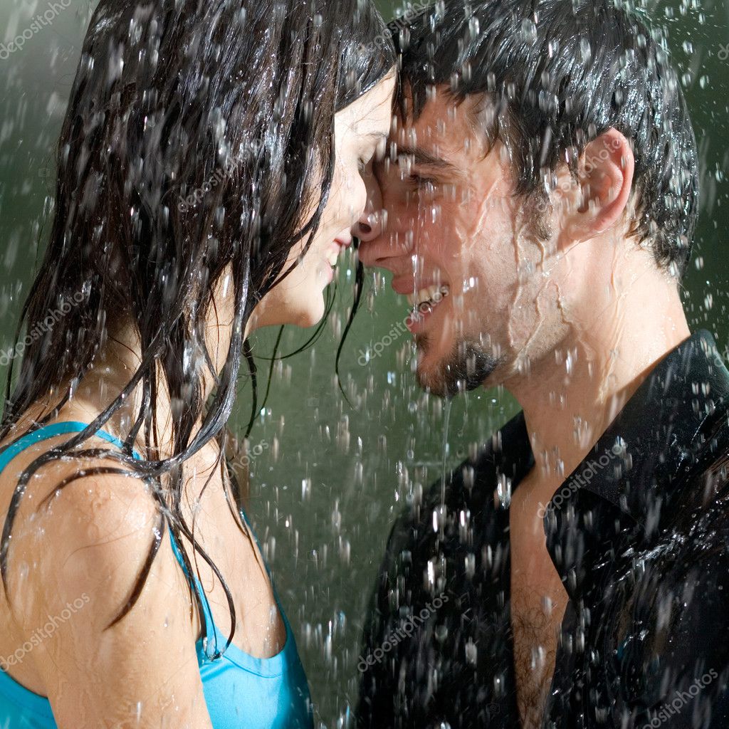 Couples Hugging In Rain