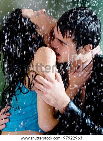 Couples Hugging In Rain