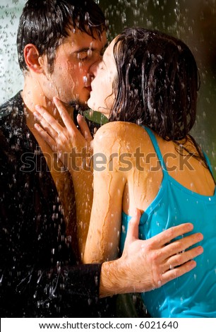 Couples Hugging In Rain